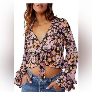 Free People floral front tie blouse. Never been worn!!